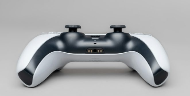 white and black game controller