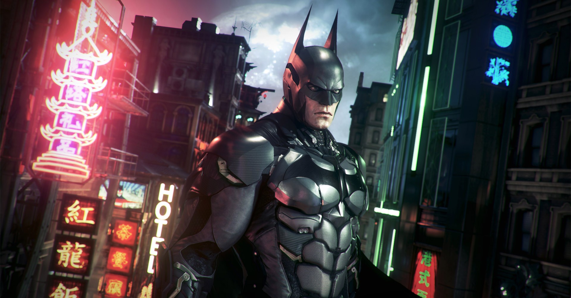 Uma captura de tela de Batman Arkham Knight com Batman parecendo mal -humorado na frente de uma paisagem urbana moderna que se parece com Tóquio, Japão Uma captura de tela de Batman Arkham Knight com Batman parecendo mal -humorado na frente de uma paisagem urbana moderna que se parece com Tóquio, Japão