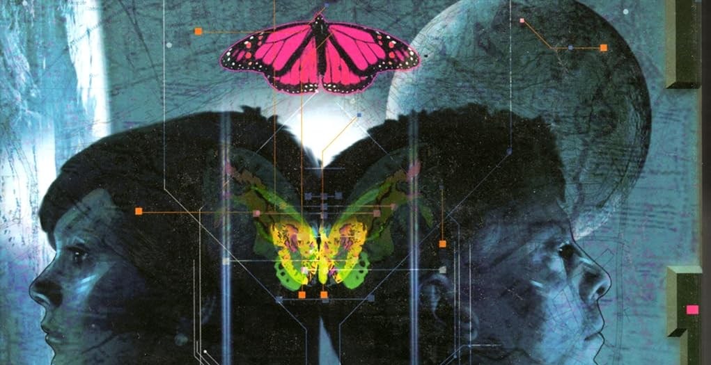 A capa da edição do clube do livro de ficção científica de John Varley's Steel Beach, com um homem e a cabeça de uma mulher de perfil, de frente para fora em direções opostas, com a lua no céu atrás deles e duas borboletas brilhantes sobrepostas sobre eles