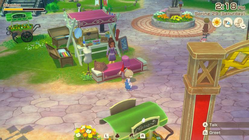 Uma captura de tela do jogo de um mercado. Possui várias barracas de todas as formas e tamanhos. Captura de tela de Story of Seasons: Grand Bazaar.