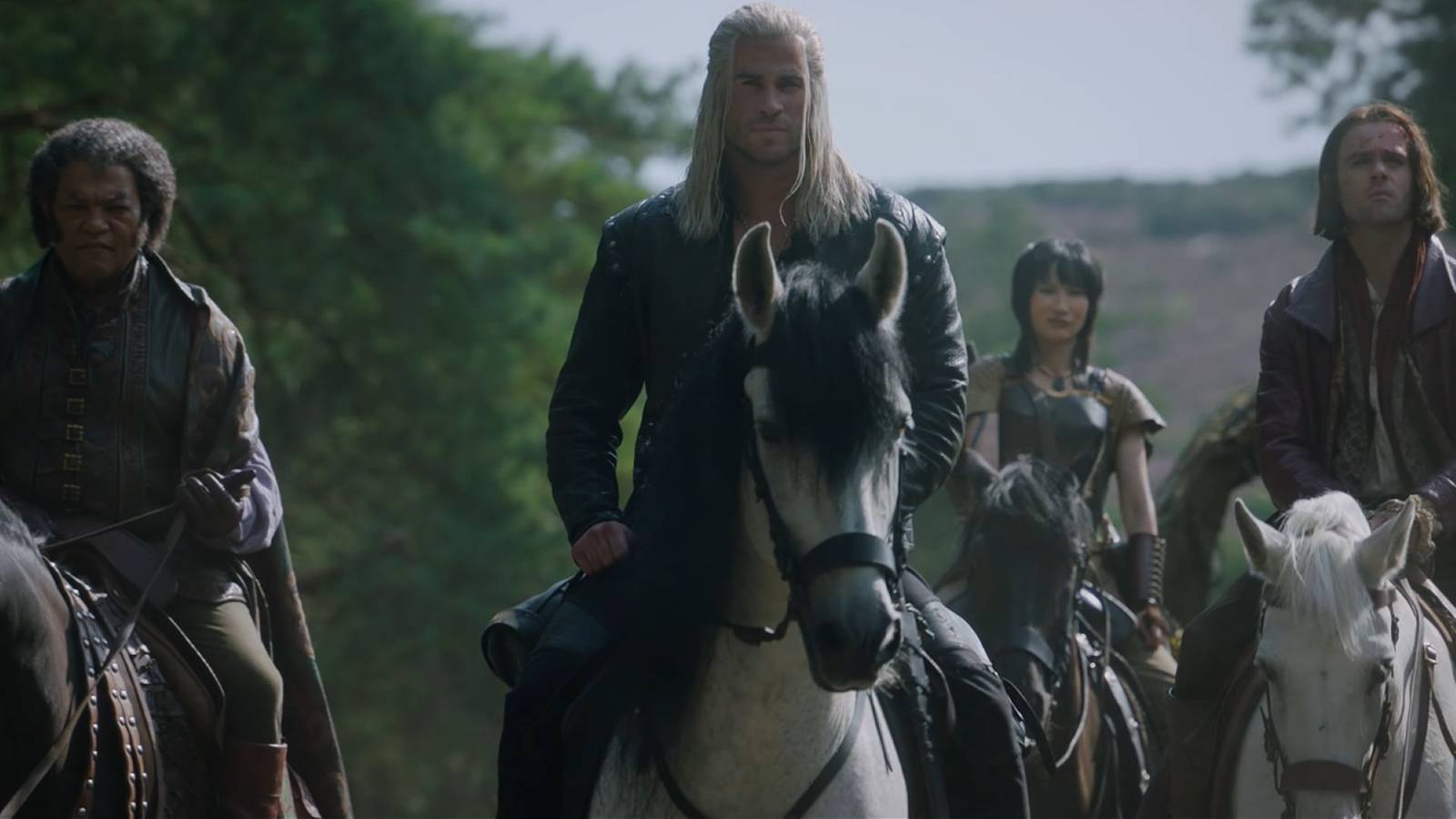 Geralt, Jaskier e mais em uma captura de tela da 4ª temporada de The Witcher.