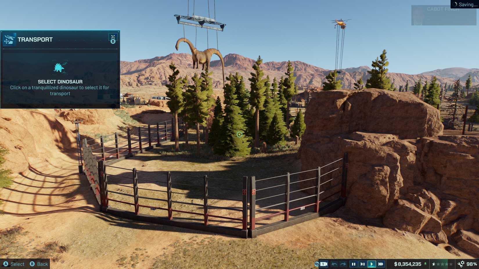 Dois dinossauros são transportados de helicóptero de volta aos seus recintos.