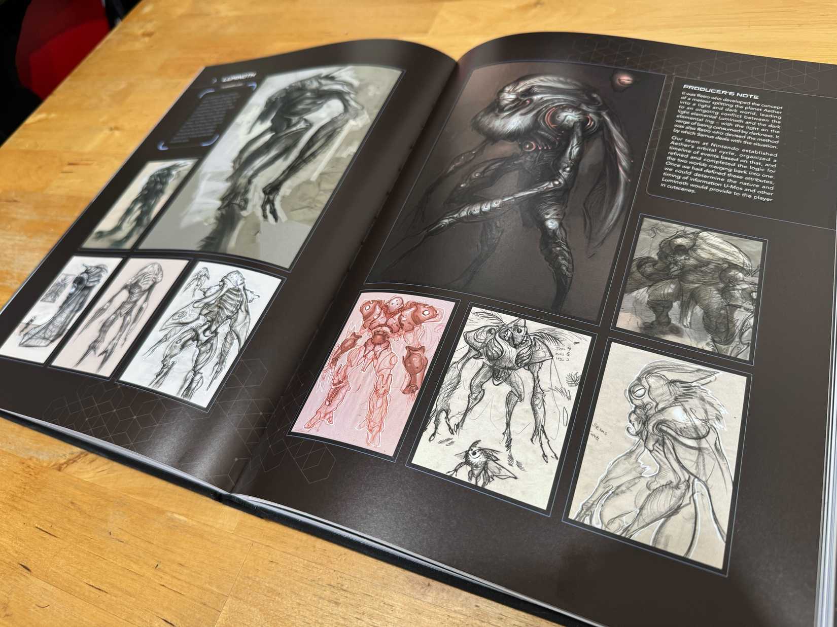 O livro de arte principal de Metroid está sobre uma mesa.