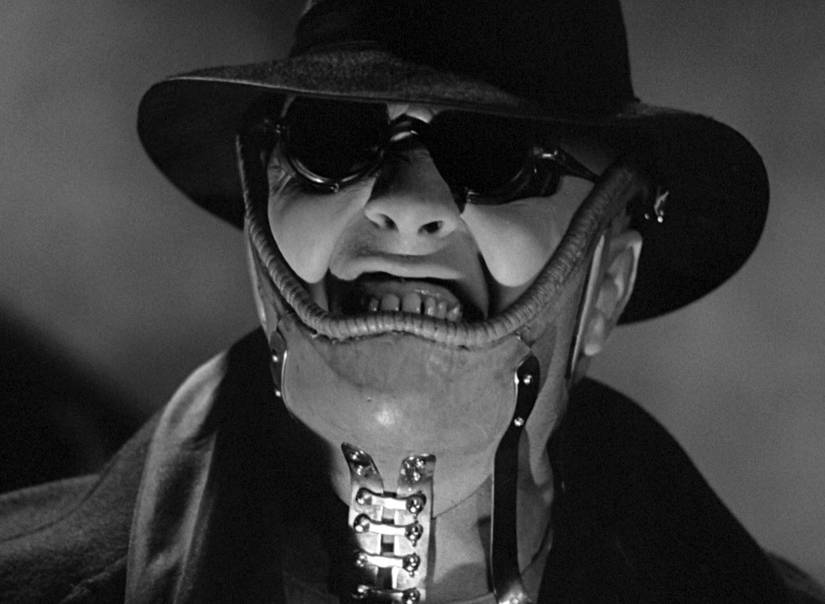 Peter Lorre com uma engenhoca estranha da boca no amor louco