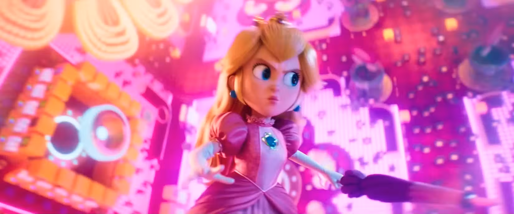 Princesa Peach faz uma careta e empunha um guarda-chuva rosa na frente de um fundo rosa neon no trailer do filme Super Mario Galaxy 