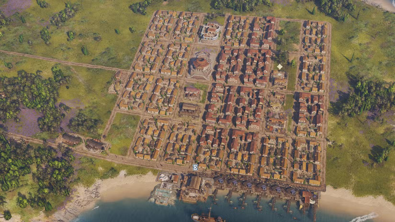 Uma cidade com layout de grade no Anno 117: Pax Romana.