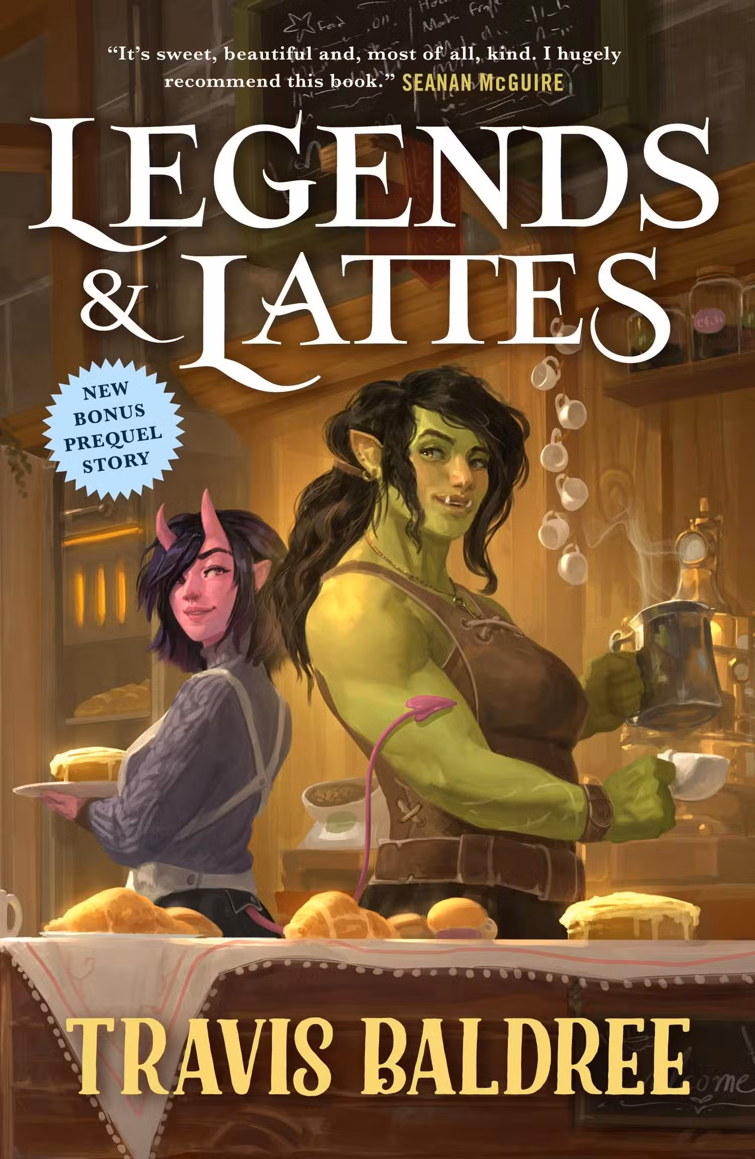 A capa de Legends & Lattes de Travis Baldree, retratando uma orc musculosa de cabelos pretos servindo café em frente a um balcão coberto de assados, enquanto uma mulher de pele vermelha, com chifres e cauda de demônio está atrás dela