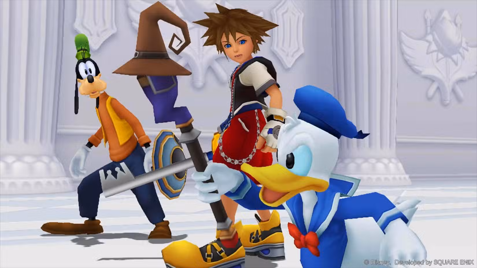 O protagonista de Kingdom Hearts, Sora, olha para o companheiro Pato Donald, enquanto Pateta fica ao fundo.