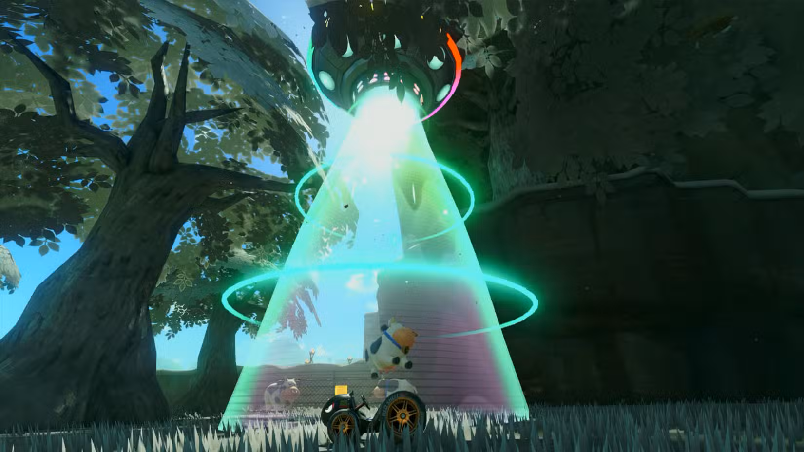 Uma vaca sendo sugada pelo raio trator de um OVNI em Mario Kart World.