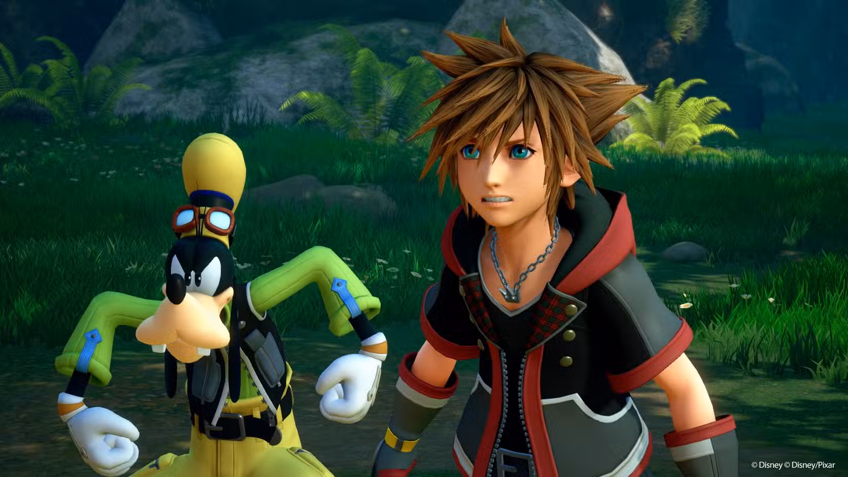 Imagem de Kingdom Hearts 3 do Pateta parecendo louco ao lado de Sora