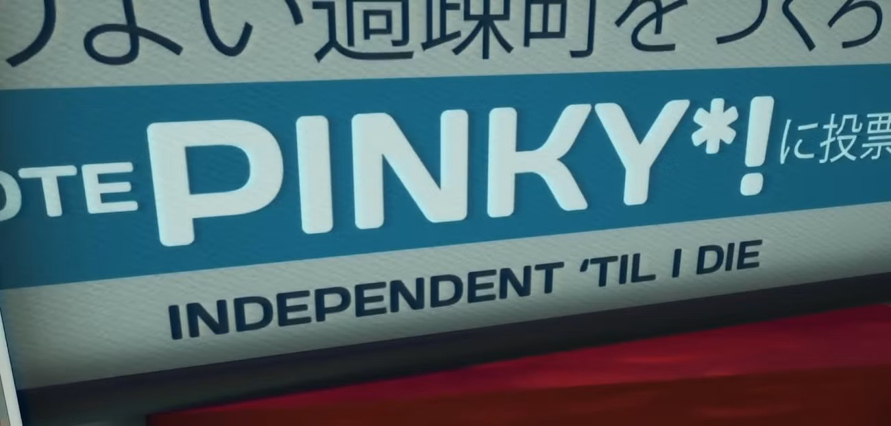 Um banner de campanha em um caminhão diz "Vote Pinky! Independente até eu morrer."