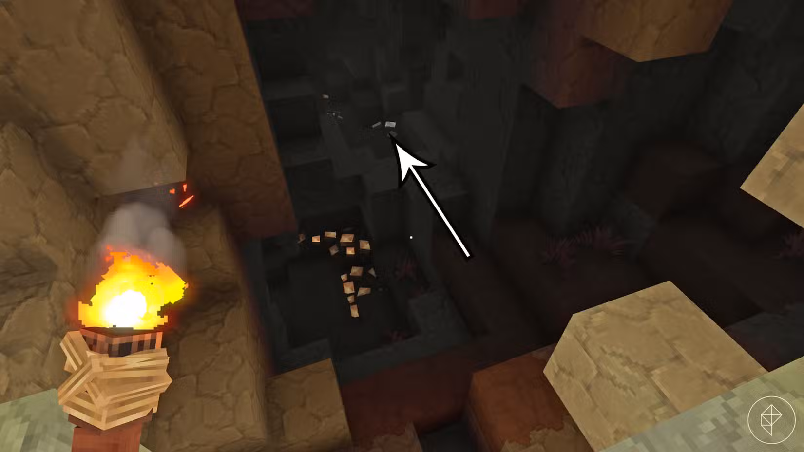 Um veio cintilante de minério de ferro dentro de uma caverna mal iluminada em Hytale.