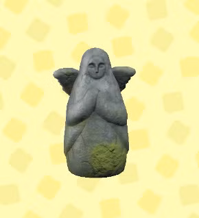 Uma estátua de uma deusa redonda com pequenas asas em ACNH