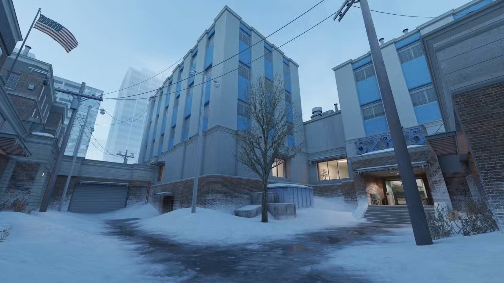 As áreas externas do Office no Counter-Strike 2, com neve no chão.