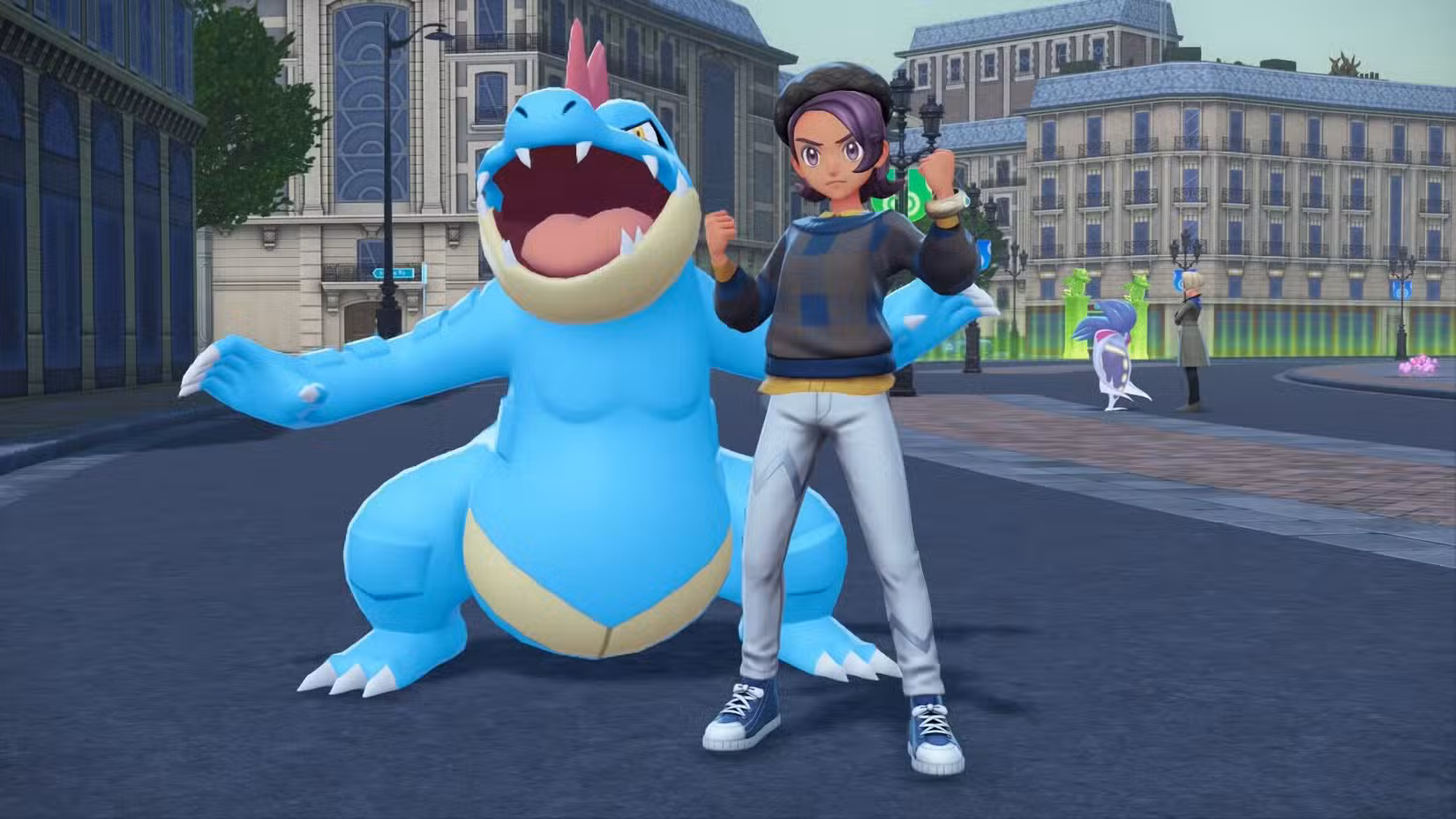 Um treinador posa com Feraligator em Pokémon Legends ZA.