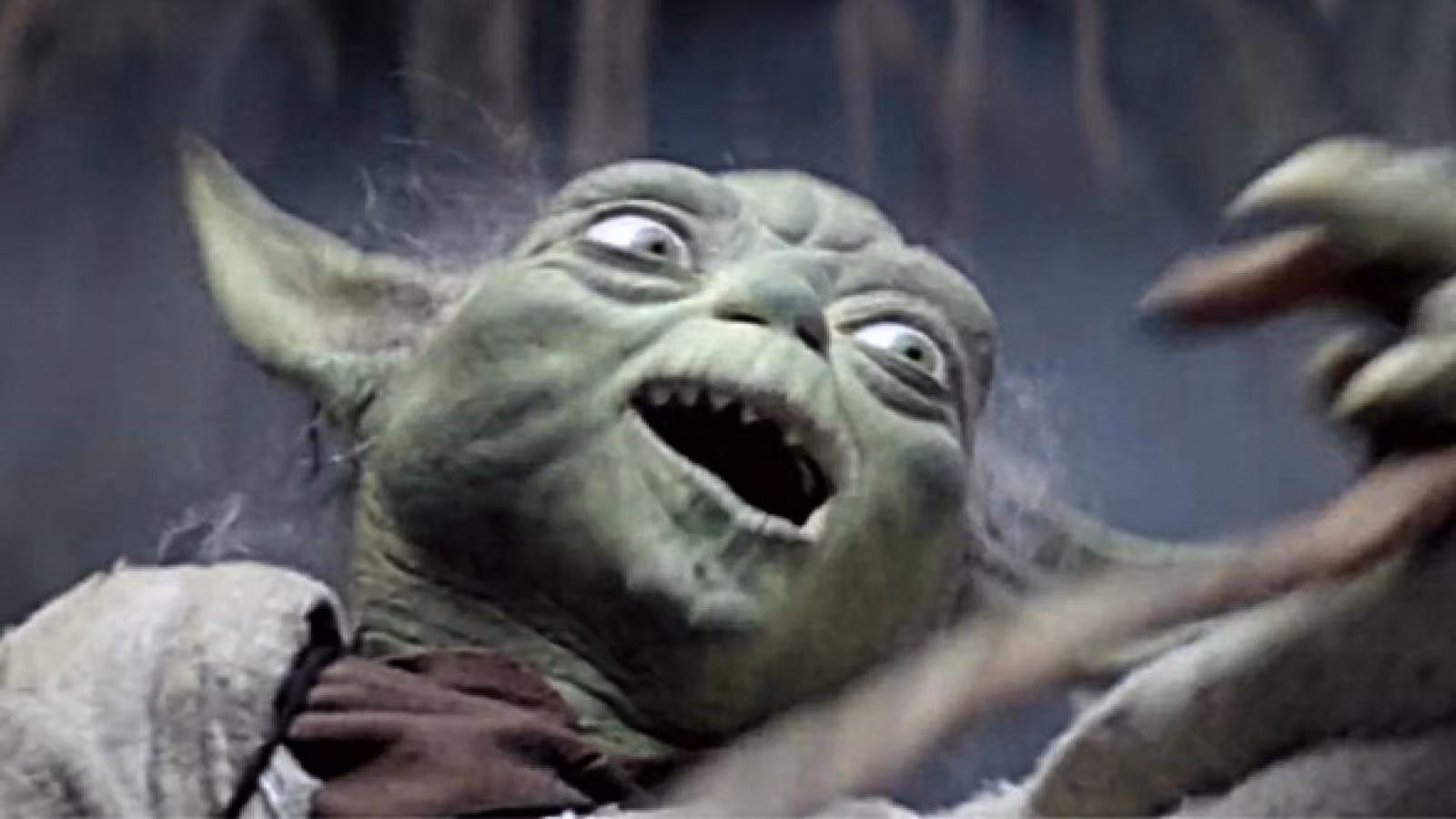 Yoda de Star Wars com os olhos arregalados e a boca aberta