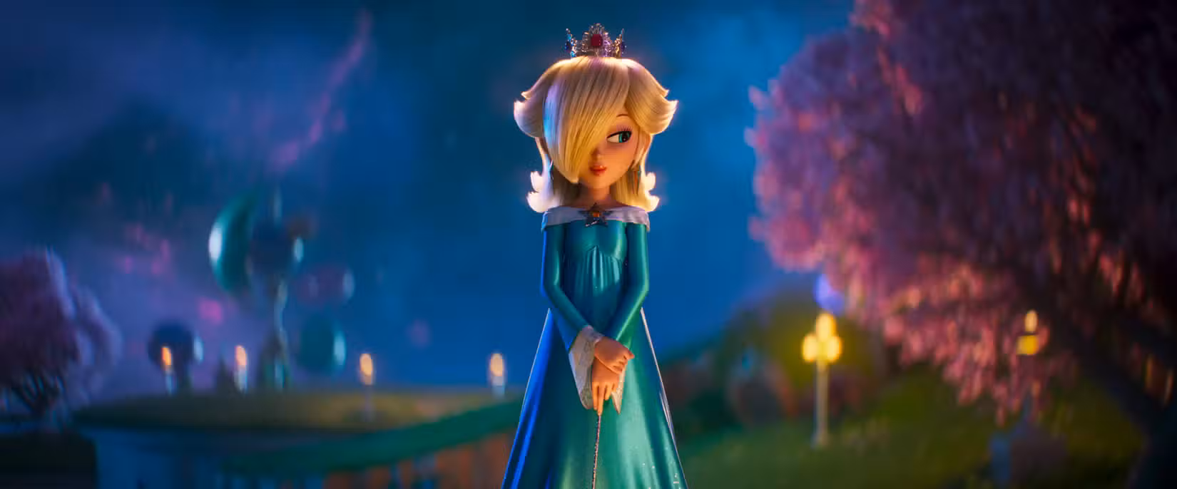 Rosalina fica com as mãos cruzadas, lá fora, no escuro, no filme Super Mario Galaxy.